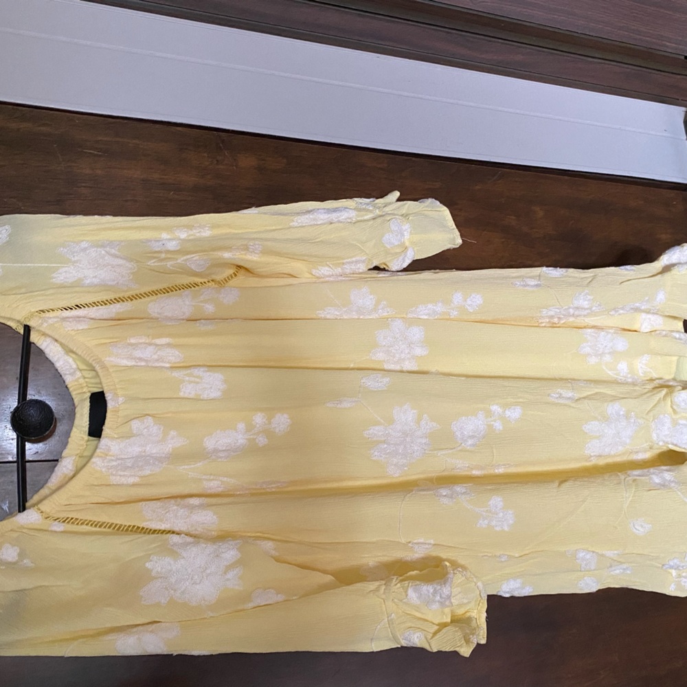 Yellow knee length dress